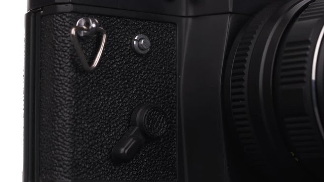 Single-lens reflex camera. A close-up of a manual self-timer mounted on a camera. Camera intended for taking pictures on black-and-white and color films