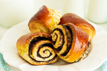 Buns rolls with poppy seeds and nuts. Selective focus.
