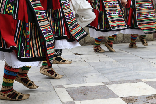 Gara Bov, Bulgaria - May 4, 2019: People dressed with traditional Bulgarian authentic folklore clothes dance Bulgarian horo in Gara Bov, Bulgaria