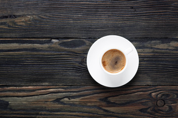 Fresh and aromatic coffee in a white cup