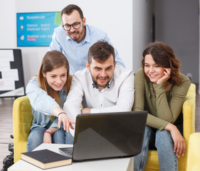 Fototapeta premium Young people with laptop