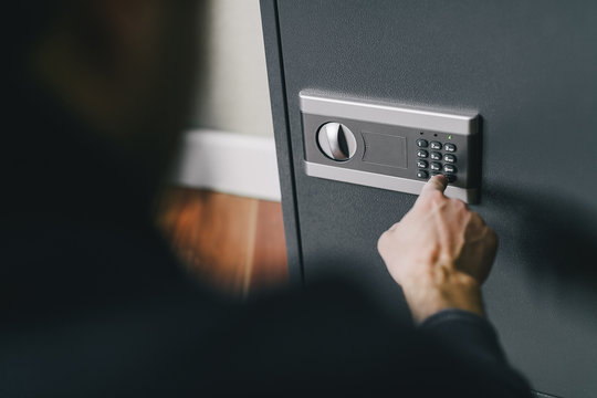 Man Opens Safe, Combination Lock