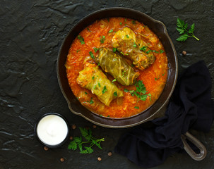 Ukrainian traditional dish with cabbage and stuffed cabbage. Selective focus.