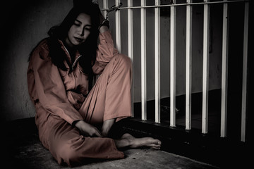 Hands of women desperate to catch the iron prison,prisoner concept,thailand people,Hope to be...
