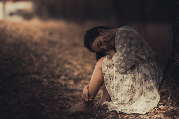 Portrait of beautiful asian chic girl pose for take a picture on wall background,Lifestyle of teen thailand people,Sad woman from love concept,