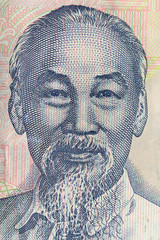 Ultra macro shot of Ho Chi Minh portrait from Vietnamese money banknote.
