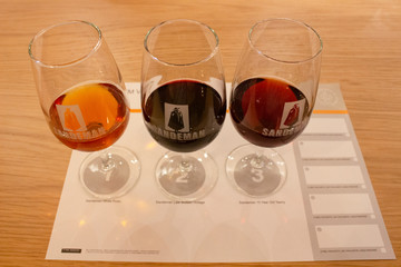 Wine tasting at Sandeman cellar in Vila Nova de Gaia, Portugal. Sandeman is a brand of Port wine founded in 1790.