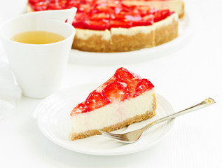 Classic cheesecake with fresh strawberries. Selective focus.