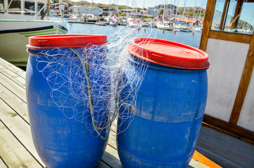 Idyllic Barrels with fishnet in Skärhamn, Sweden