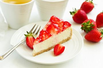 Classic cheesecake with fresh strawberries. Selective focus.