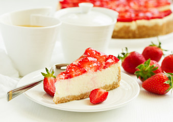 Classic cheesecake with fresh strawberries. Selective focus.