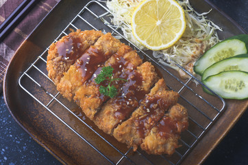 Deep fried pork  or Japanese tonkatsu.