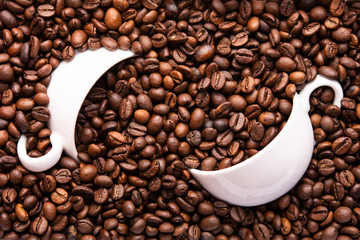 two white cup of coffee beans top view
