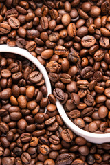 two white cup of coffee beans top view