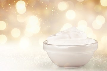 close up of a white beauty cream or yogurt on white background with clipping path