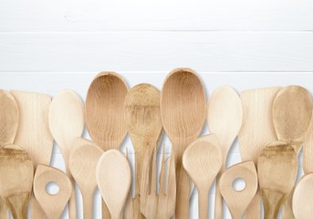 Kitchen metal and wooden utensil on  background