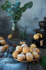 Fototapeta na wymiar Homemade shortbread nuts with condensed milk. Dessert - biscuits for tea.