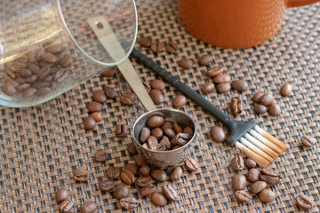 coffee beans in a transparent cup