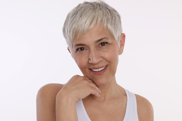 Happy Smiling Mature Woman Portrait on white background. Older skin care, Anti-aging and Beauty concept.