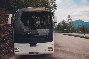 burned bus on the highway in Austria