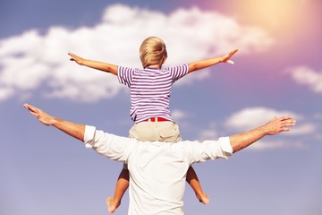 Family happy outside sunset vacation lifestyle hug