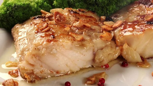 slide shot cod fish with smoke