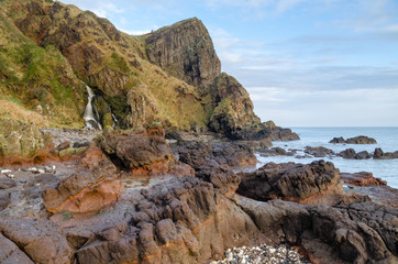 Fototapeta na wymiar The Gobbins is a cliff-face path etched out along the dramatic shoreline of Islandmagee, County Antrim, Northern Ireland along the Causeway Coast. It was the brain-child of an Irish railway engineer 