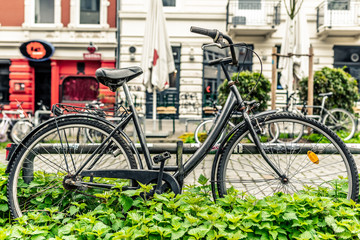 Fototapeta na wymiar A parked vintage bicycle in the Schanzenviertel Neighborhood in Hamburg, Germany