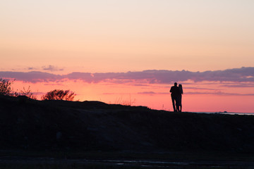 Fototapeta premium silhouette of man on top of mountain