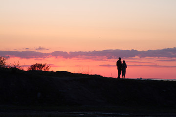 silhouette of photographer at sunset