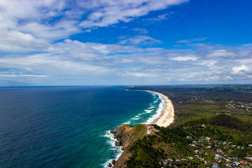 Fototapeta na wymiar aerial view of Wategoes Beach at Byron Bay with lighthouse. The Photo was taken out of a Gyrocopter, Byron Bay, Queensland, Australia