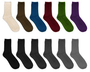 Socks of different colors. Socks in two rows on a white background. Multicolor socks on white background.