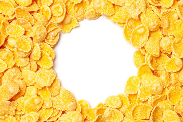 Cornflakes dry breakfast. Yellow flakes in a bunch of framed circle isolated on white background