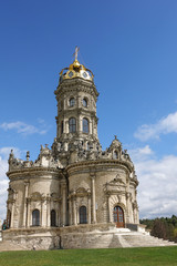 Fototapeta na wymiar Exterior view to Church of Sign of Blessed Virgin in Dubrovitsy Znamenskaya church in Podolsk Moscow region, Russia