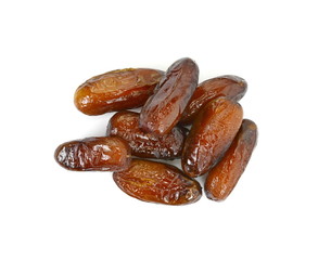 Dried dates over white background. Heap of dried dates isolated on white background.