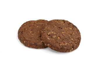 Round chocolate whole wheat biscuit, cookie with raisins isolated on white background. Chocolate Biscuits with whole-wheat (wholemeal) flour isolated on white background 