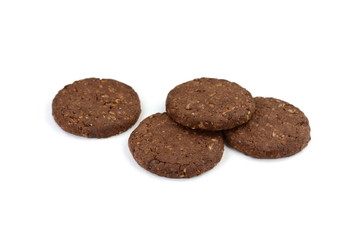 Round chocolate whole wheat biscuit, cookie with raisins isolated on white background. Chocolate Biscuits with whole-wheat (wholemeal) flour isolated on white background 