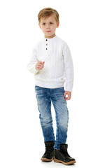 Fototapeta premium The little boy frowned.