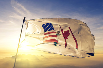 North American Free Trade Agreement NAFTA flag waving on the top
