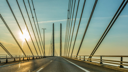 Obraz premium Driving a car over the oresund bridge