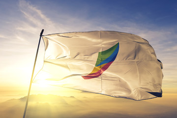 North Jeolla province of South Korea flag waving on the top sunrise mist fog