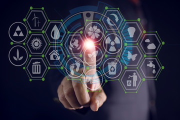 hand pushing button on a touch screen interface