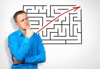 Business complex man maze answer arrow background