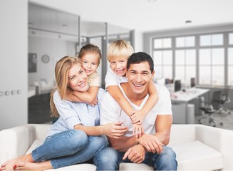 Beautiful smiling family on background