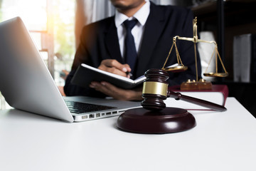 Lawyer working with laptop and interface icon