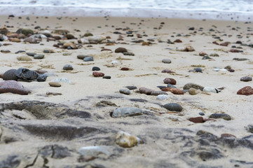 sea stones on the beach, stones on the sand