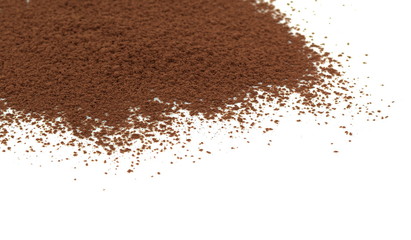 Pile cocoa powder isolated on white background.