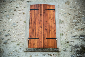 Fototapeta na wymiar Close-up of an old window in Northern France