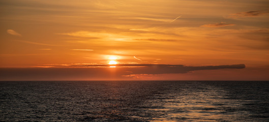 Sunset from the ferry over water