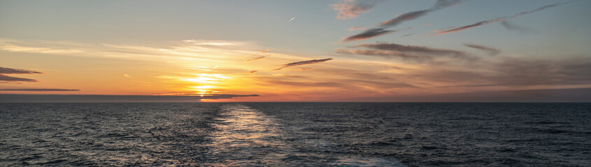 Sunset from the ferry over water